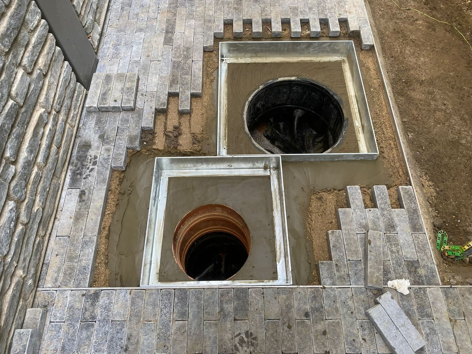 Block paving finished with seamless recessed manhole covers — the details done p